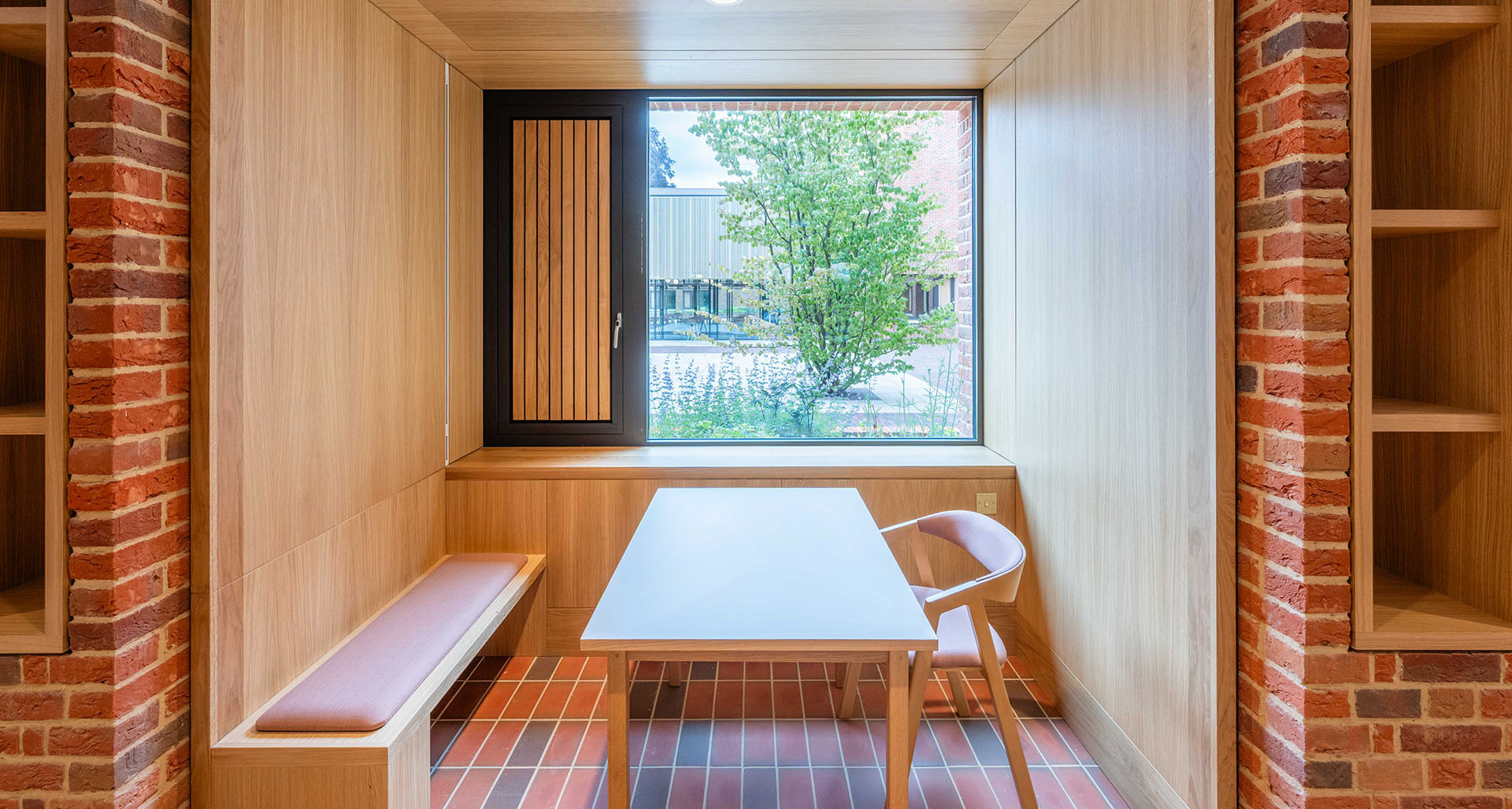 light multi quarry tiles reflect the brickwork at the new Winchester College boarding houses